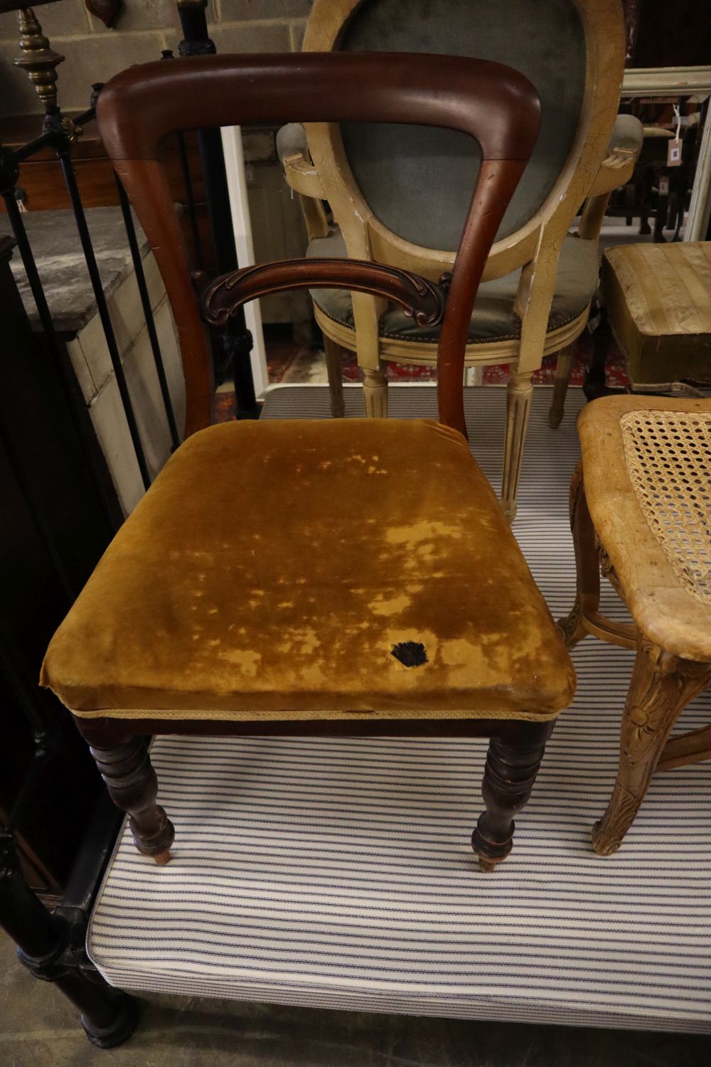 A carved bleached mahogany caned stool and two Victorian chairs
